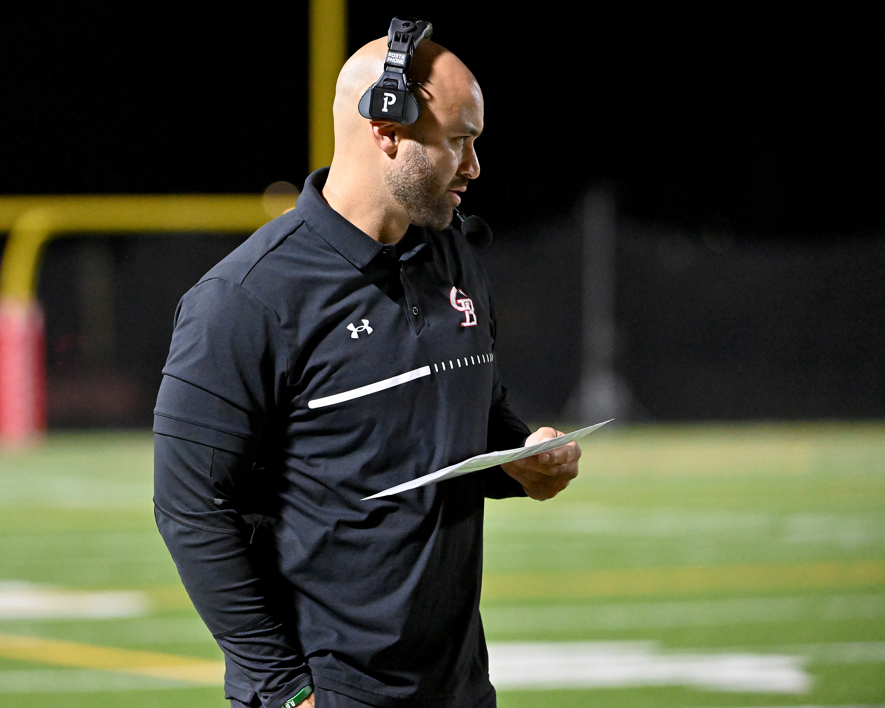 Nov. 14, 2025: Glen Burnie coach Alec Lemon in the first quarter. The Glen Burnie Gophers defeat the visiting Meade Mustangs, 41-35, in a MPSSAA Class 4A East Region second round playoff football game. (Paul W. Gillespie/Staff)