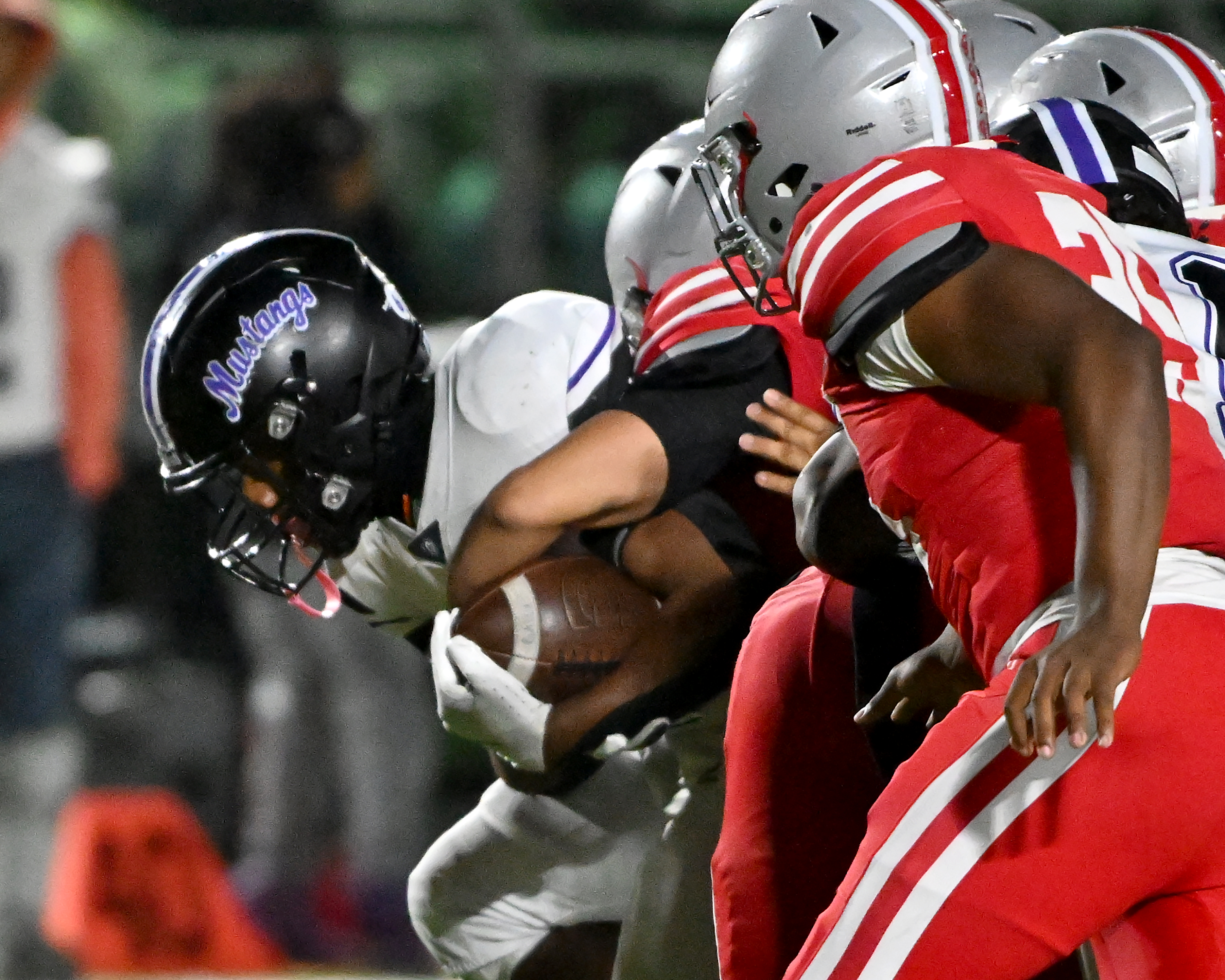 Nov. 14, 2025: Meade's Jayden Rumley is stopped on a run in the second quarter. The Glen Burnie Gophers defeat the visiting Meade Mustangs, 41-35, in a MPSSAA Class 4A East Region second round playoff football game. (Paul W. Gillespie/Staff)