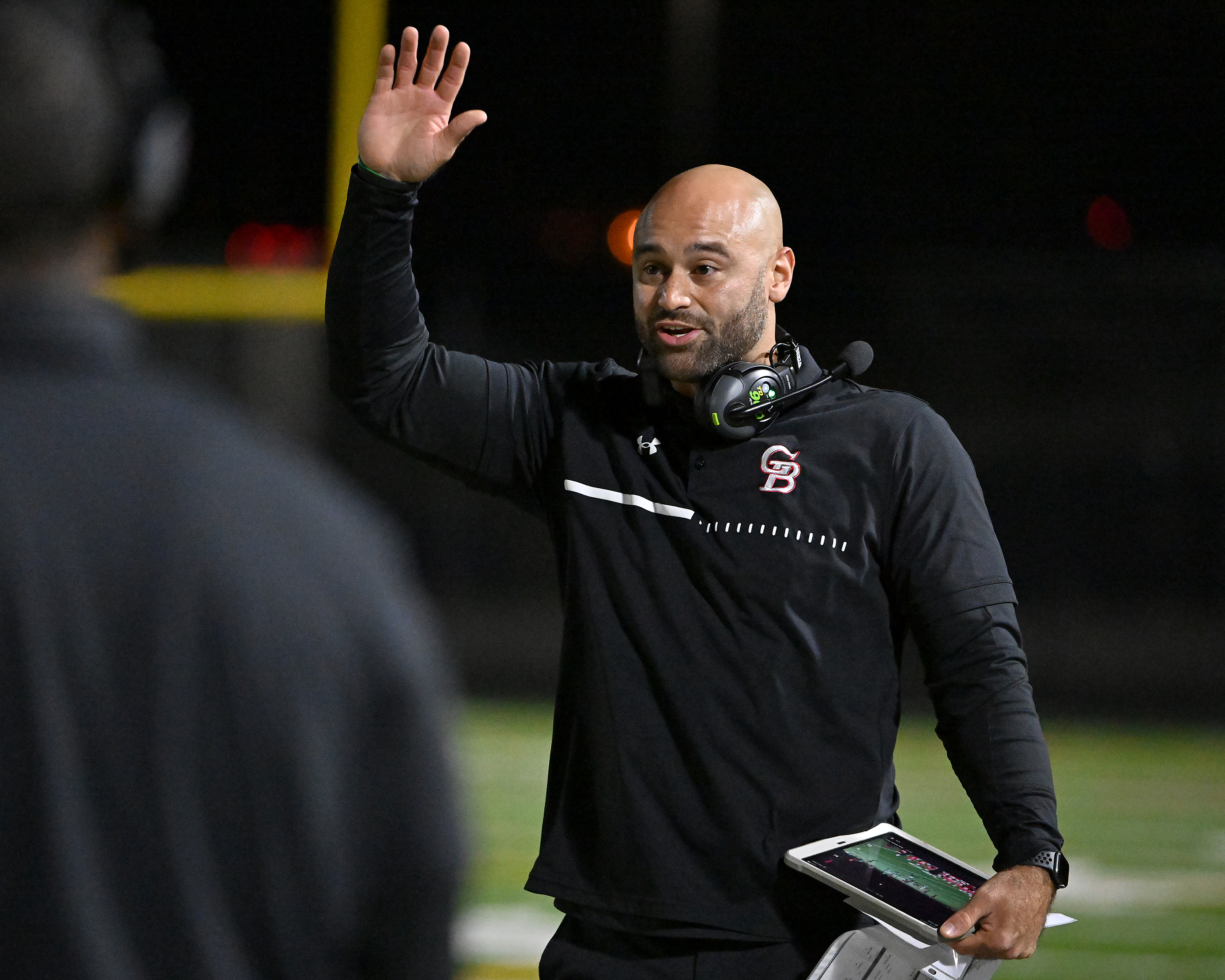 Nov. 14, 2025: Glen Burnie coach Alec Lemon in the second quarter. The Glen Burnie Gophers defeat the visiting Meade Mustangs, 41-35, in a MPSSAA Class 4A East Region second round playoff football game. (Paul W. Gillespie/Staff)