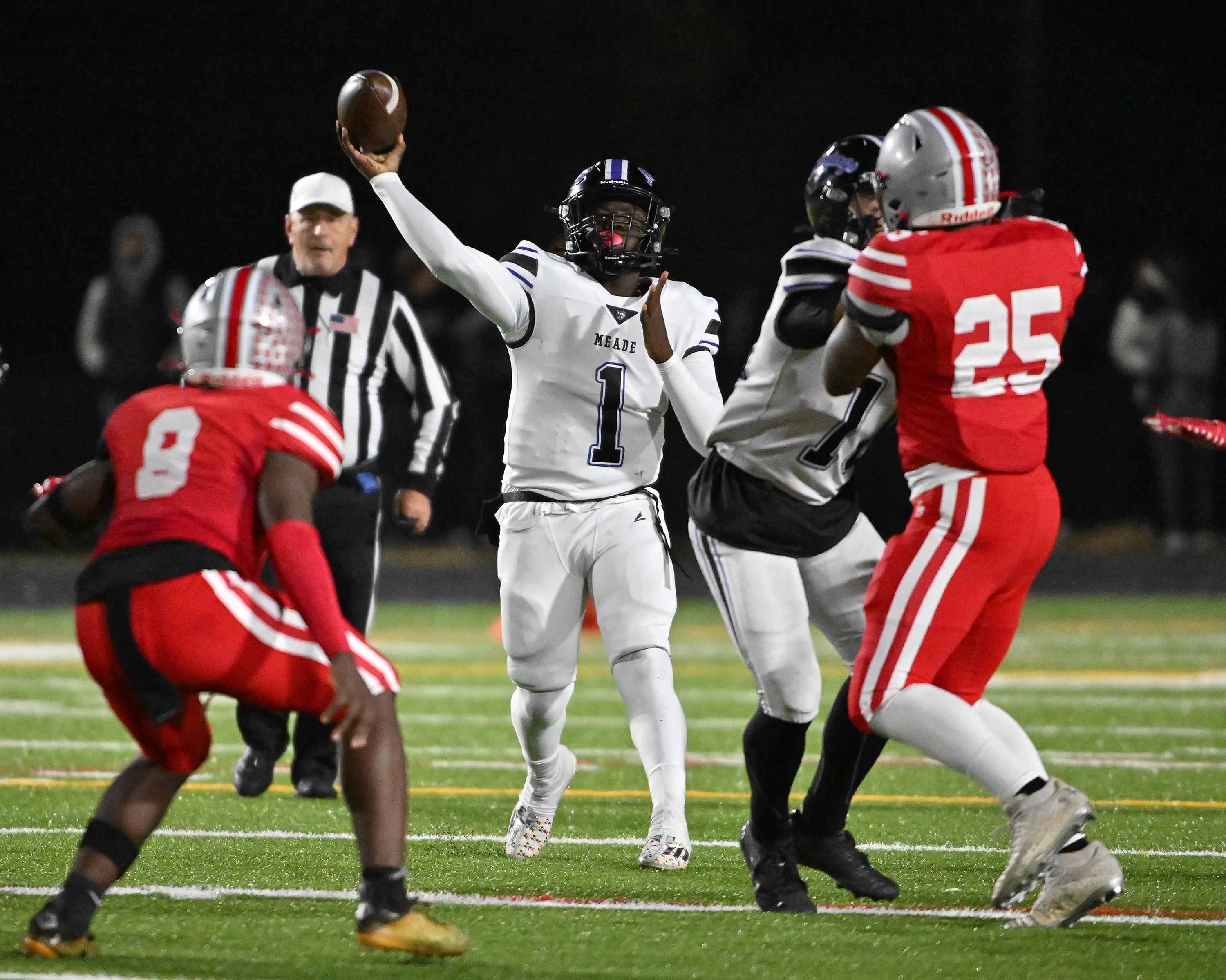 Nov. 14, 2025: Meade quarterback K'dyn Rogers throws in the second quarter. The Glen Burnie Gophers defeat the visiting Meade Mustangs, 41-35, in a MPSSAA Class 4A East Region second round playoff football game. (Paul W. Gillespie/Staff)