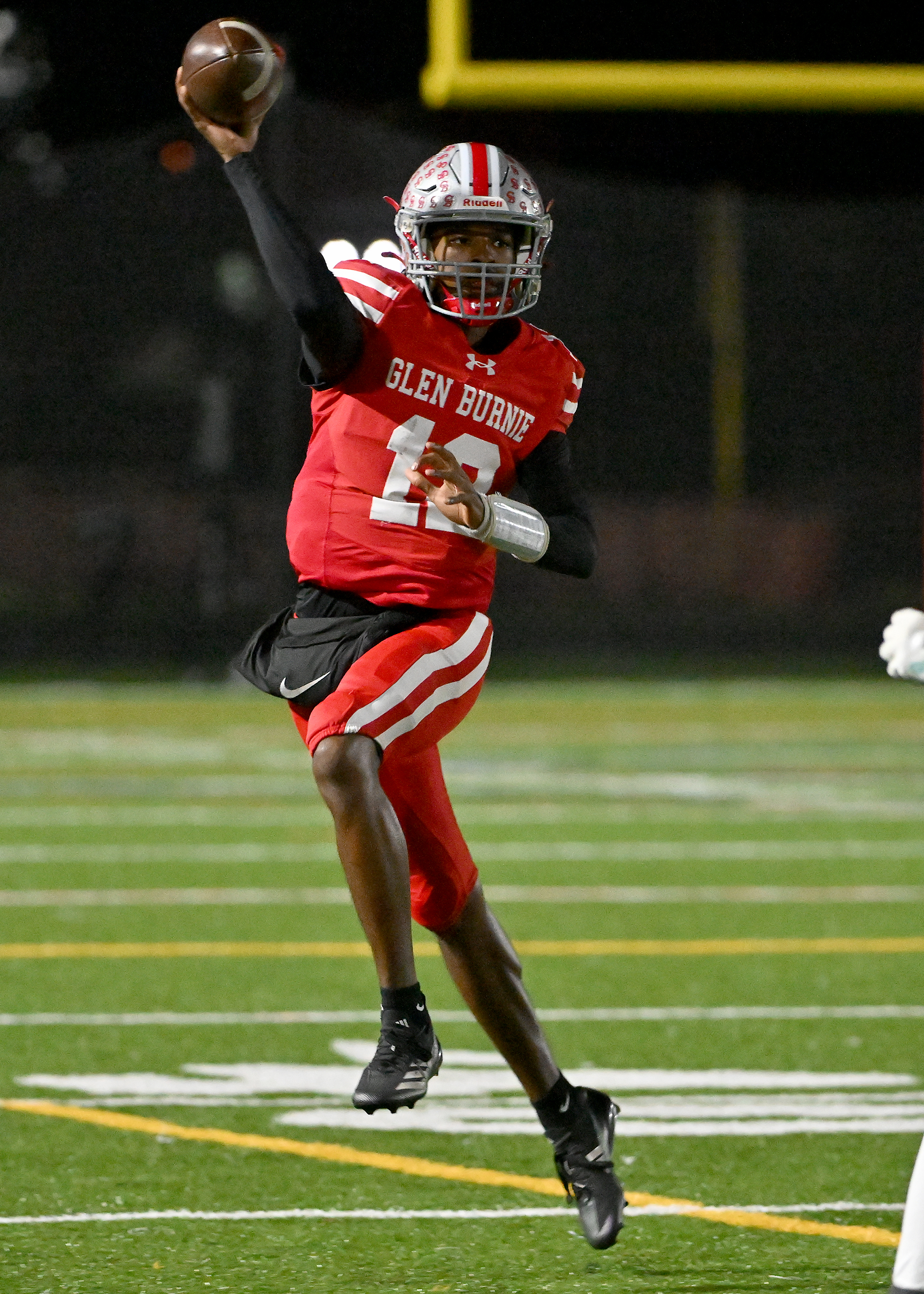 Nov. 14, 2025: Glen Burnie's Robert Saunders ​throws a pass to Kendall Taylor ​who runs it in for a touchdown in the second quarter. The Glen Burnie Gophers defeat the visiting Meade Mustangs, 41-35, in a MPSSAA Class 4A East Region second round playoff football game. (Paul W. Gillespie/Staff)