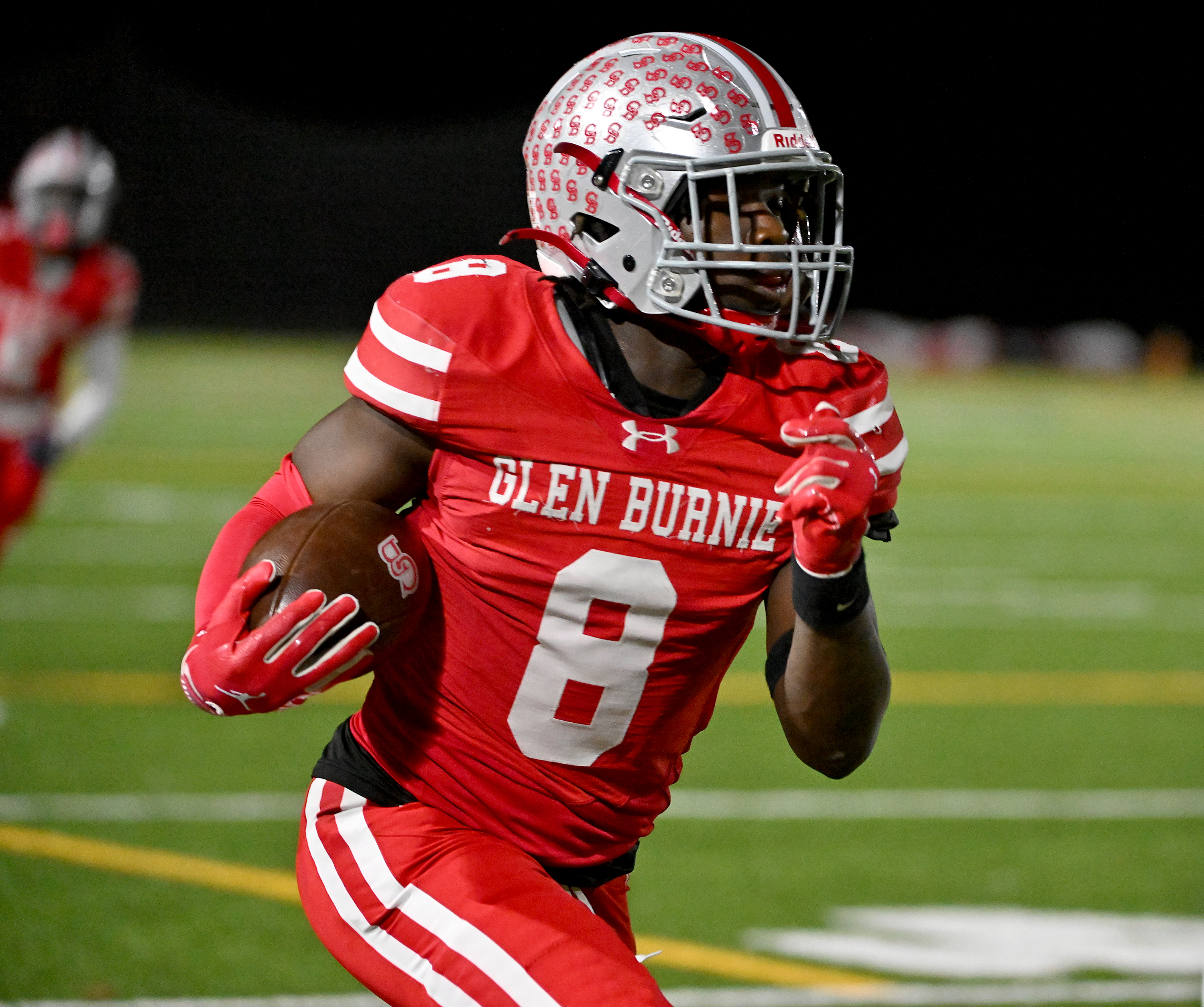 Nov. 14, 2025: Glen Burnie's Kendall Taylor gains big yards after a catch and runs for a touchdown in the second quarter. The Glen Burnie Gophers defeat the visiting Meade Mustangs, 41-35, in a MPSSAA Class 4A East Region second round playoff football game. (Paul W. Gillespie/Staff)