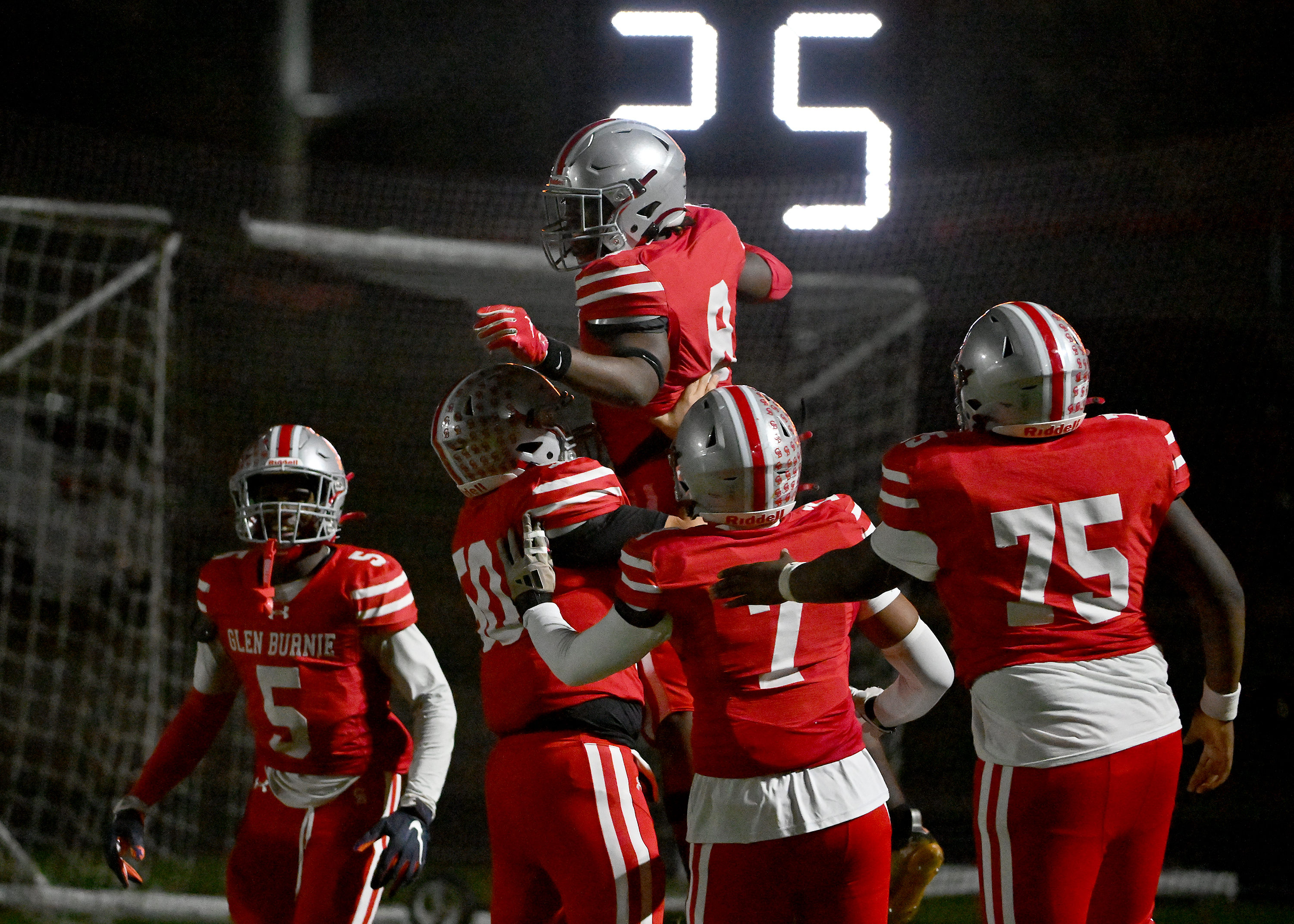 Nov. 14, 2025: Glen Burnie's Kendall Taylor gains big yards after a catch and runs for a touchdown in the second quarter. The Glen Burnie Gophers defeat the visiting Meade Mustangs, 41-35, in a MPSSAA Class 4A East Region second round playoff football game. (Paul W. Gillespie/Staff)