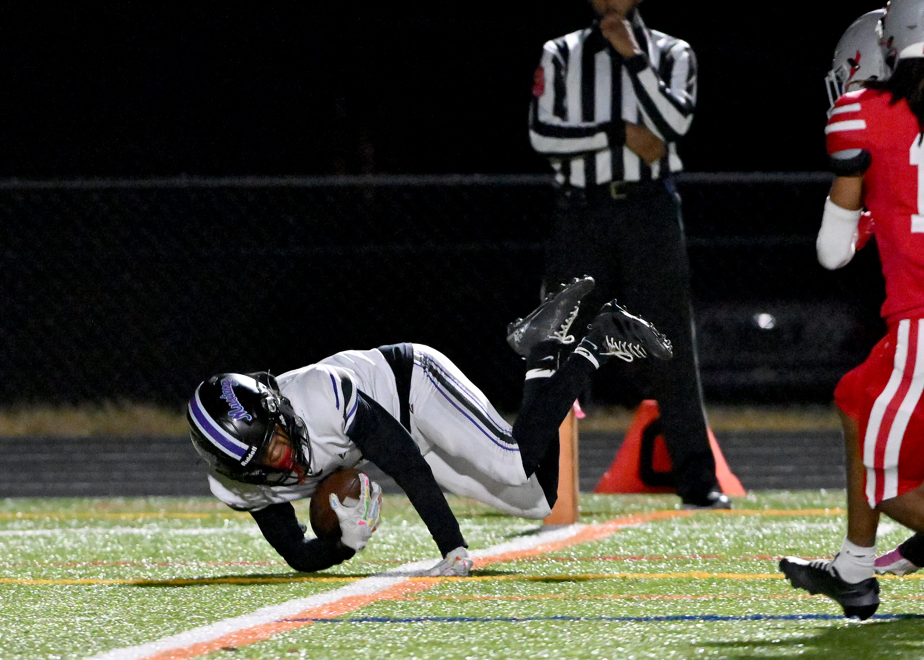 Nov. 14, 2025: Meade's Garron Armstrong makes a big touchdown catch in the second quarter. The Glen Burnie Gophers defeat the visiting Meade Mustangs, 41-35, in a MPSSAA Class 4A East Region second round playoff football game. (Paul W. Gillespie/Staff)