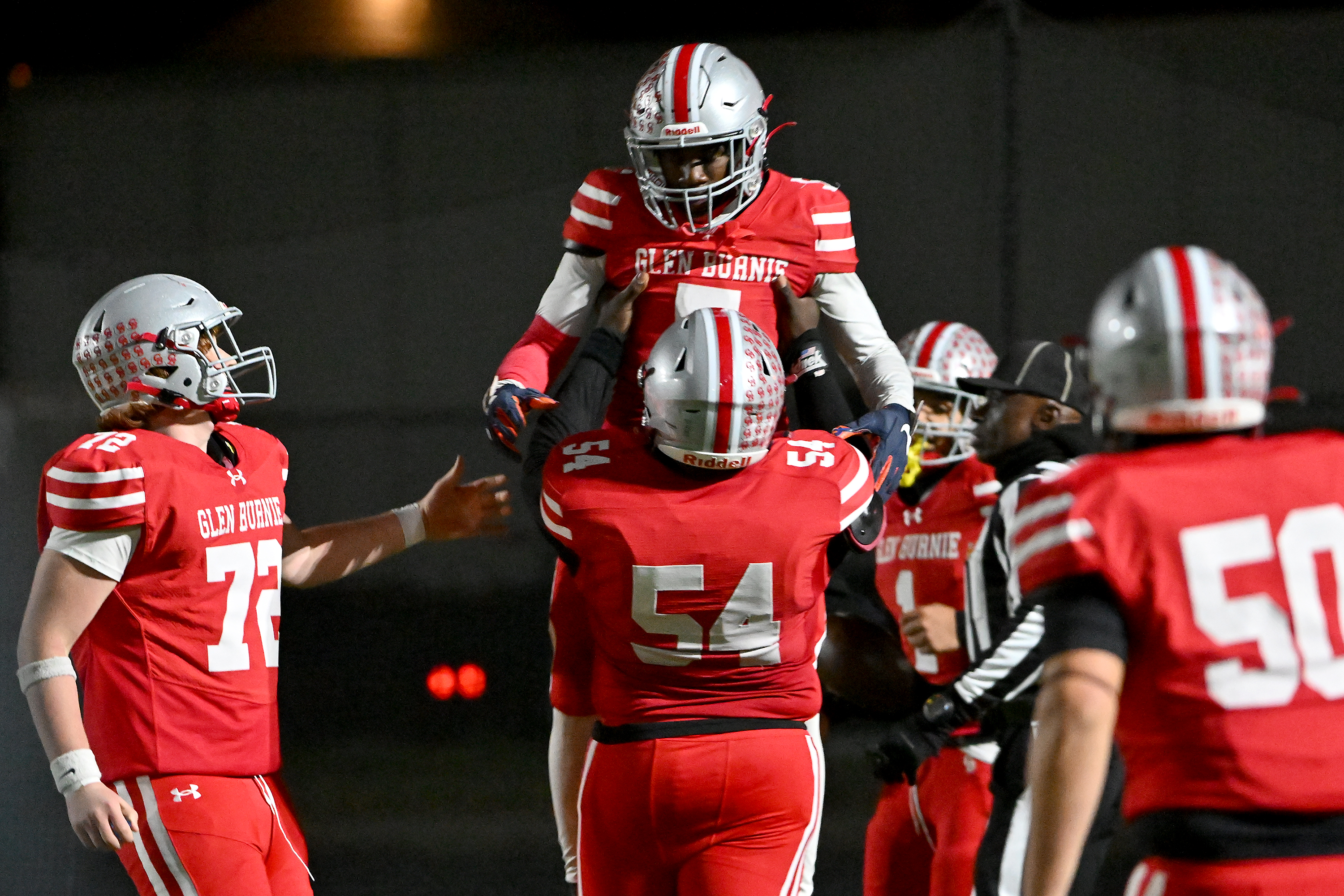 Nov. 14, 2025: Glen Burnie's Kendrick Taylor gains big yards after a catch and runs for a touchdown in the second quarter. The Glen Burnie Gophers defeat the visiting Meade Mustangs, 41-35, in a MPSSAA Class 4A East Region second round playoff football game. (Paul W. Gillespie/Staff)