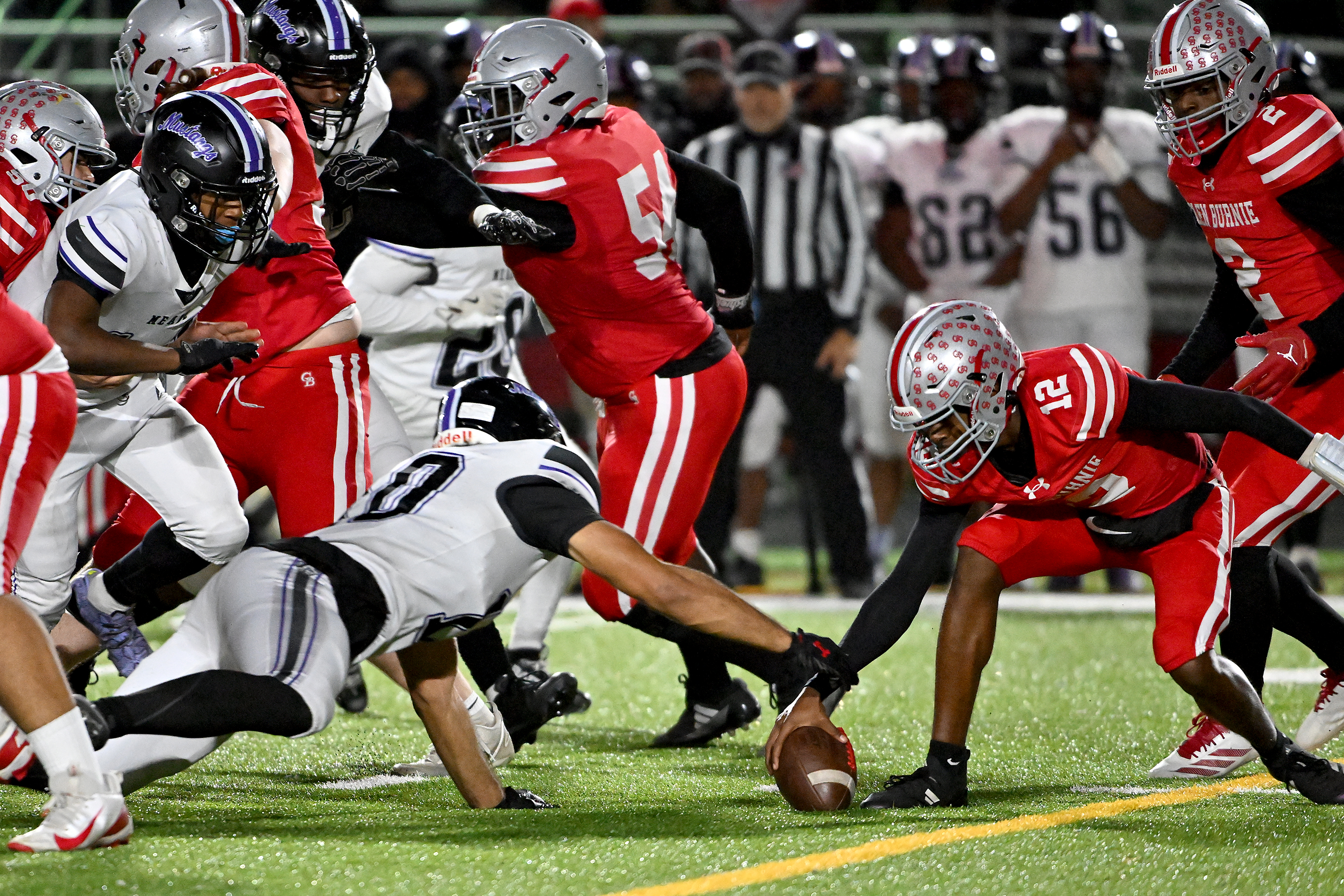 Nov. 14, 2025: Meade's Kayden McDuffie dives for and recovers a Glen Burnie quarterback Robert Saunders' ​fumble in the third quarter. The Glen Burnie Gophers defeat the visiting Meade Mustangs, 41-35, in a MPSSAA Class 4A East Region second round playoff football game. (Paul W. Gillespie/Staff)