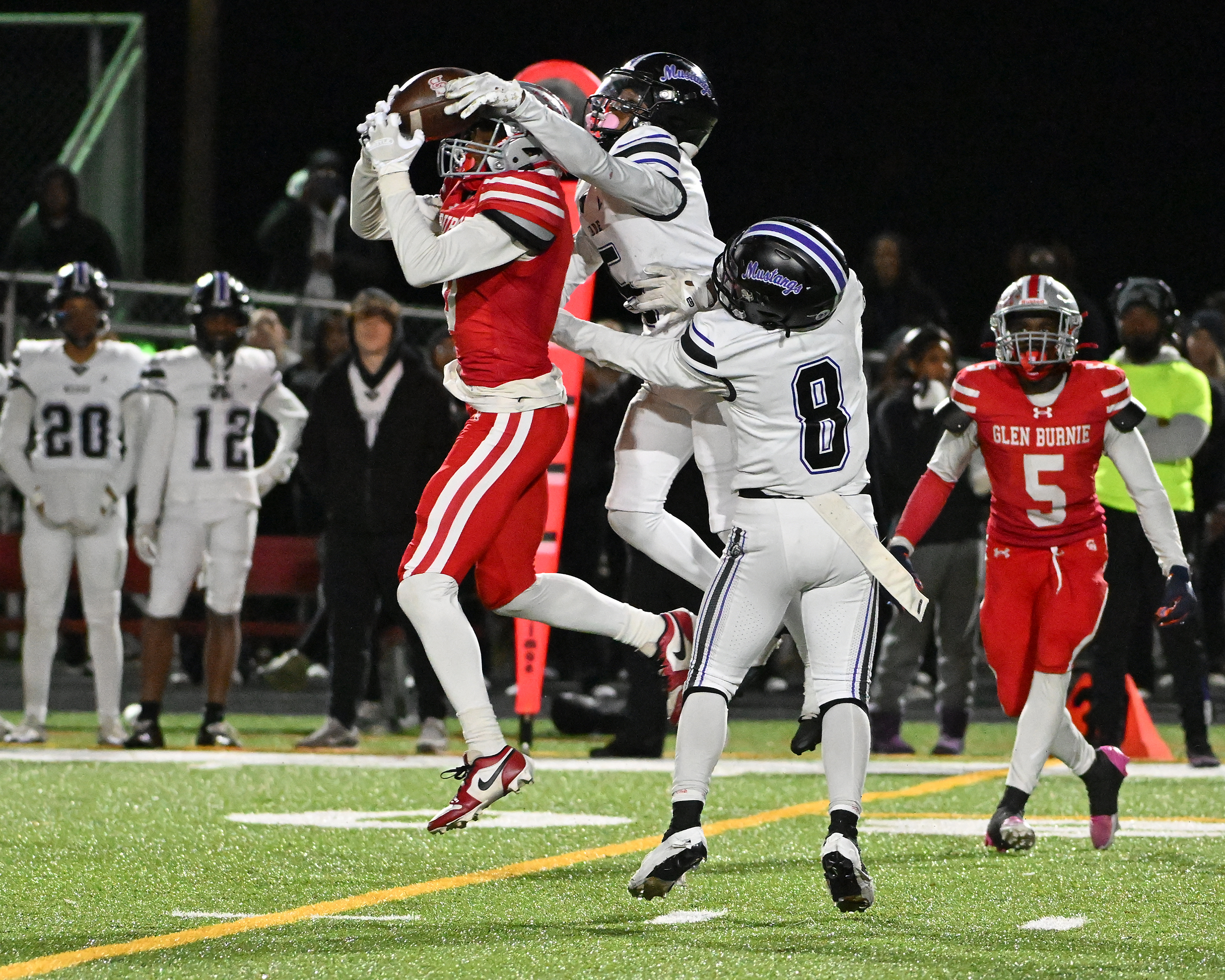 Nov. 14, 2025: Meade's Myles Edwards breaks up a pass to Glen Burnie's Chris Maddox ​in the fourth quarter. The Glen Burnie Gophers defeat the visiting Meade Mustangs, 41-35, in a MPSSAA Class 4A East Region second round playoff football game. (Paul W. Gillespie/Staff)