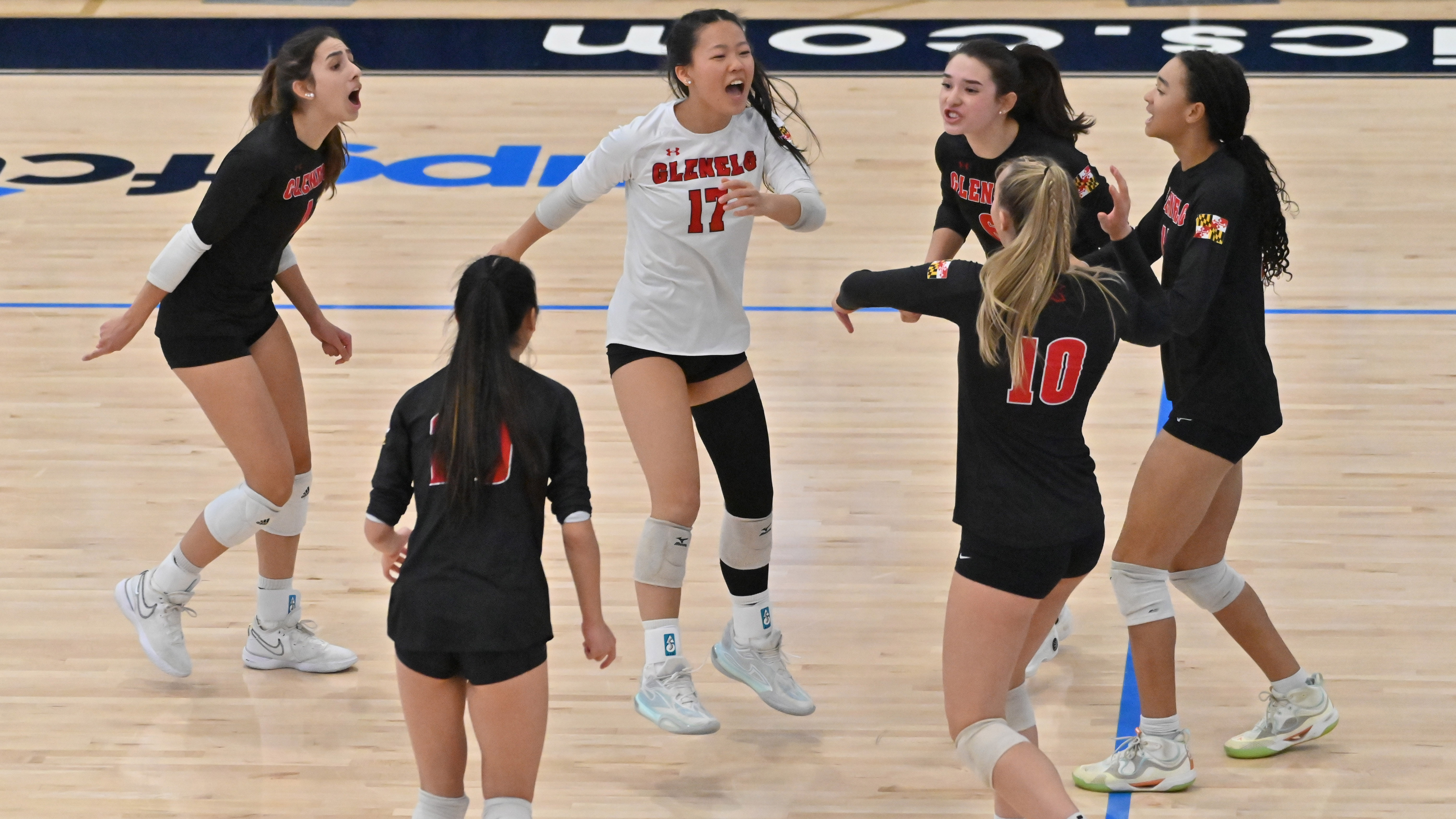 Glenelg teammates celebrate an ace by Bella Chen #17 against Williamsport during the Class 2A volleyball state championship at Harford Community College on Saturday. (Brian Krista/Staff)