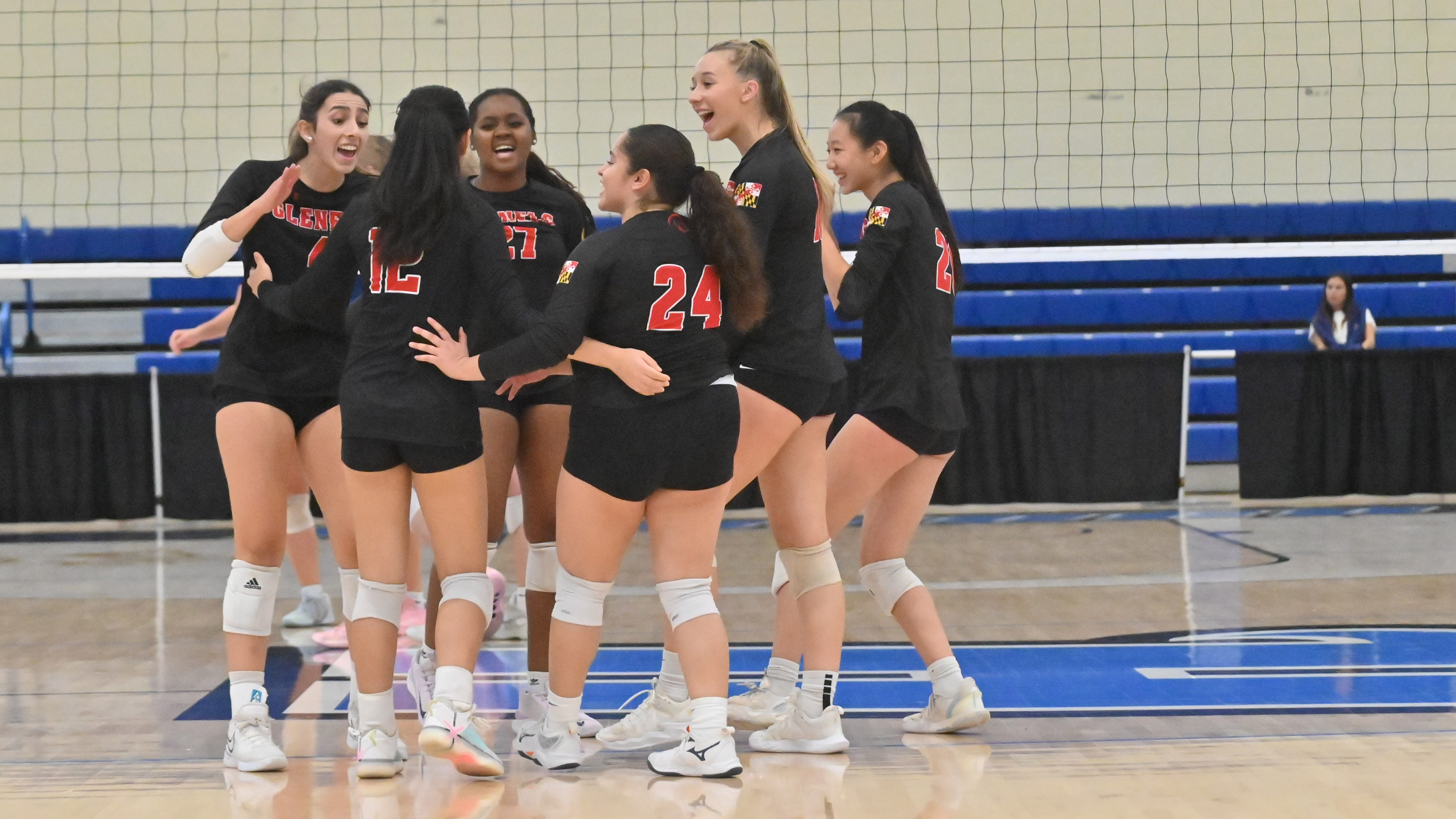 Glenelg players celebrate scoring a point against Williamsport during the Class 2A volleyball state championship at Harford Community College on Saturday. (Brian Krista/Staff)