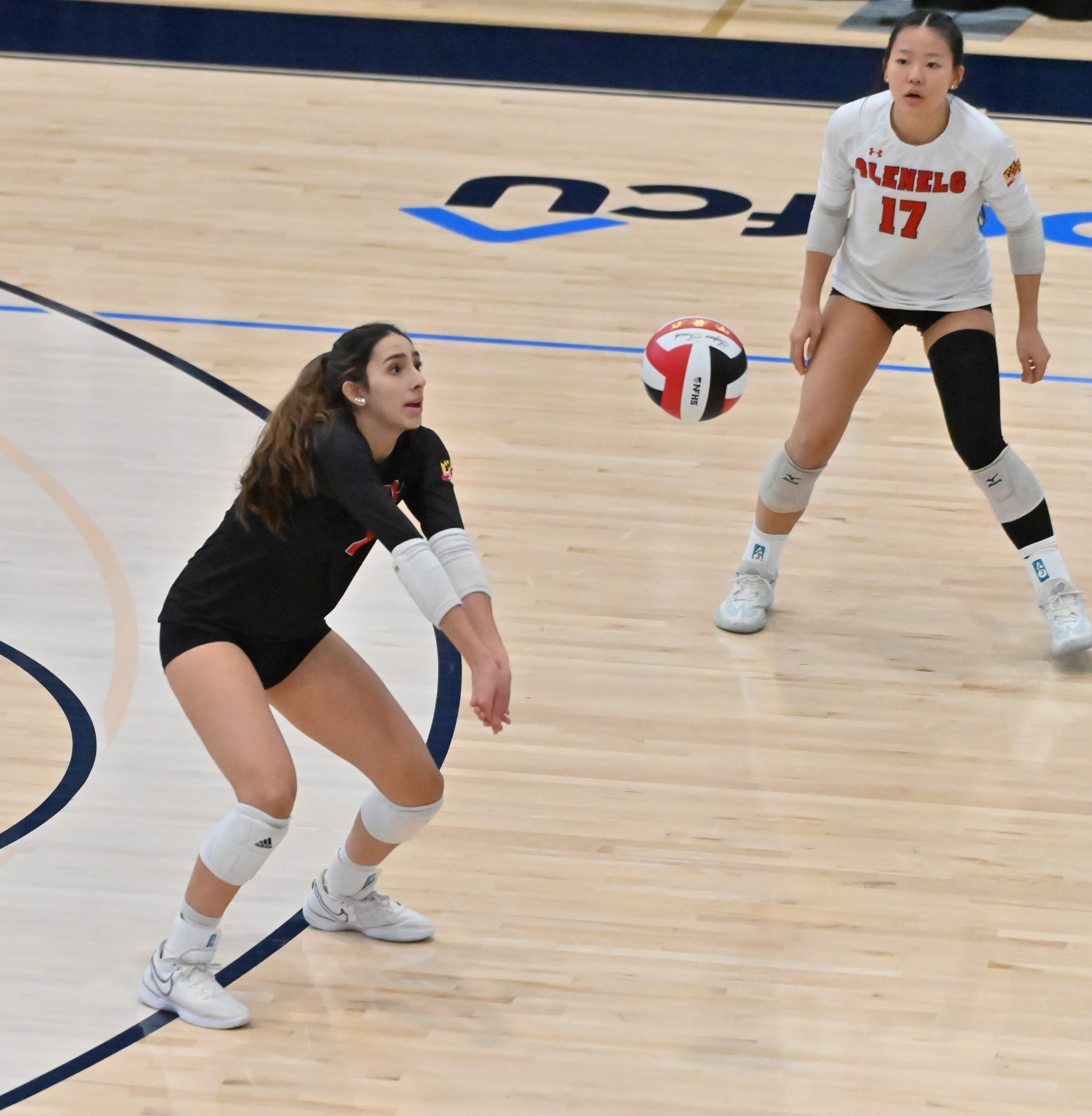 Glenelg players celebrate winning the 4th set against Williamsport during the Class 2A volleyball state championship at Harford Community College on Saturday. (Brian Krista/Staff)