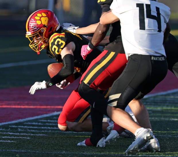 Batavia's Andrew Culotta (23)recovers a kick against Glenbard North in the fourth quarter during a Class 7A state quarterfinal game in Batavia on Saturday, Nov. 15, 2025.H. Rick Bamman/for the Beacon-News