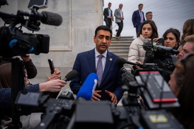 Rep. Ro Khanna, D-Calif., speaks to reporters on the steps...