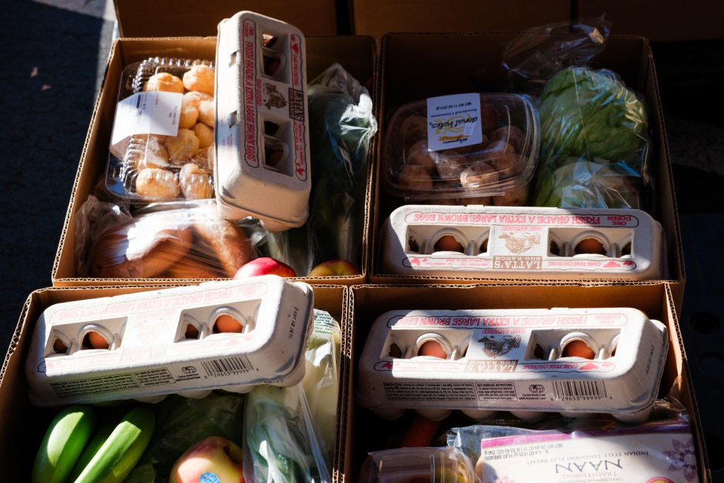 Food boxes prepared for distribution at Emmanuel Food Pantry. Photo by Cornell Watson.