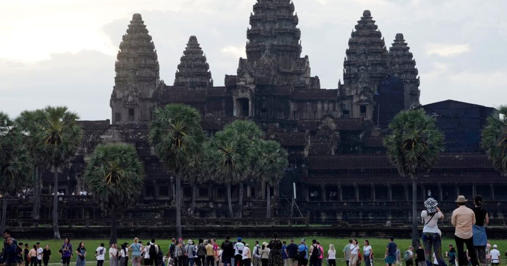 A night bus from Cambodia’s top tourist destination plunges off a bridge, killing 13 passengers