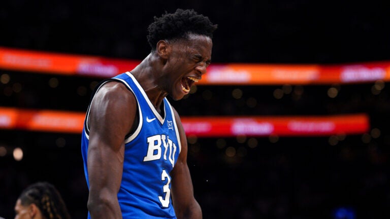 BYU Cougars forward AJ Dybantsa (3) reacts with a howl after scoring to bring BYU with in 5 points of UConn 75-70 during the 2nd half. The Connecticut Huskies played the Brigham Young Cougars Saturday, November 15, 2025 at TD Garden in Boston, MA.