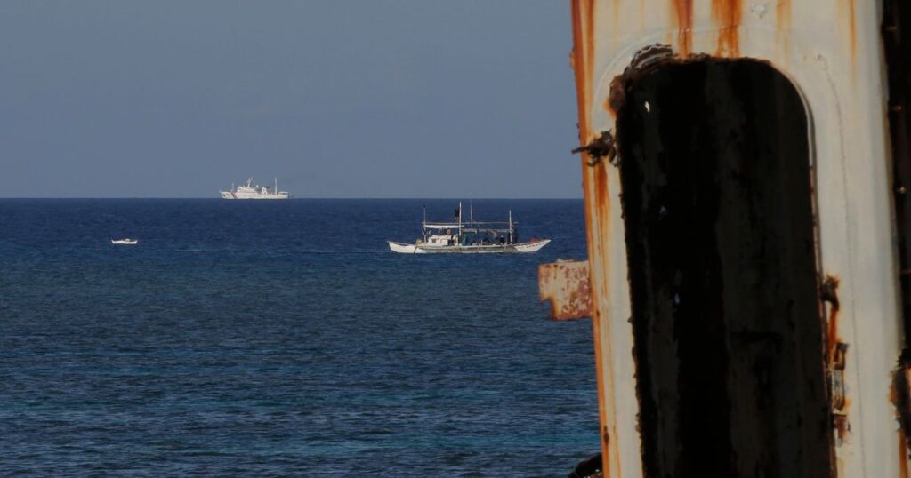 Chinese ship jams communications as Filipino forces deliver supplies to Philippines-occupied shoal