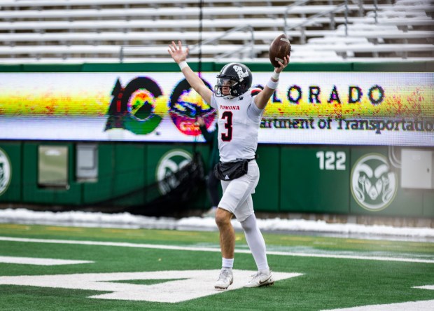 Pomona quarterback Tucker Ingersoll (3) celebrates after scoring a touchdown during the 3A football state championship game between Windsor and Pomona at Canvas Stadium on the campus of Colorado State University in Fort Collins on Saturday, Dec. 6, 2025. (Brice Tucker/Staff Photographer)