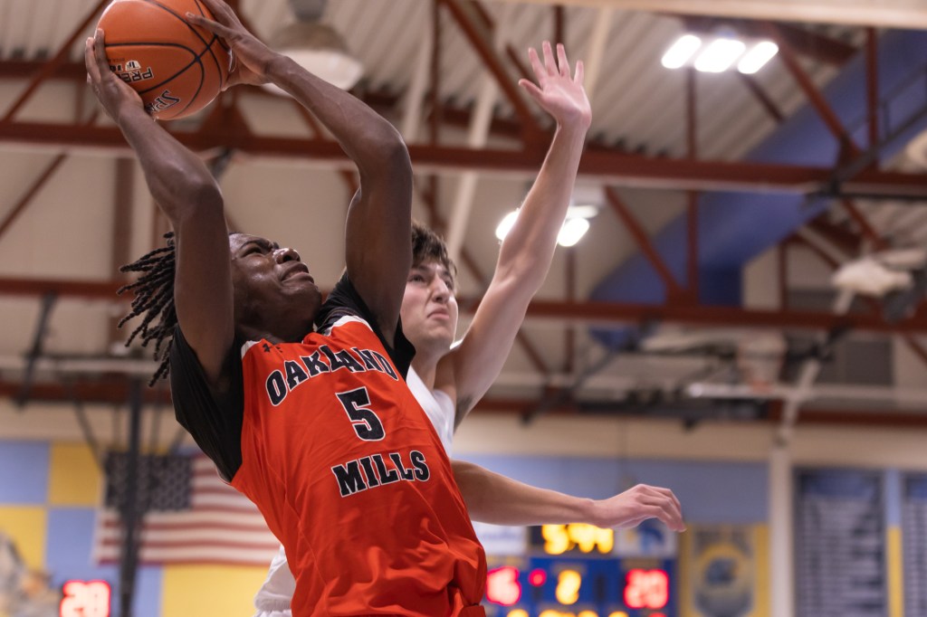 Oakland Mills boys basketball remains unbeaten with 63-58 win over River Hill