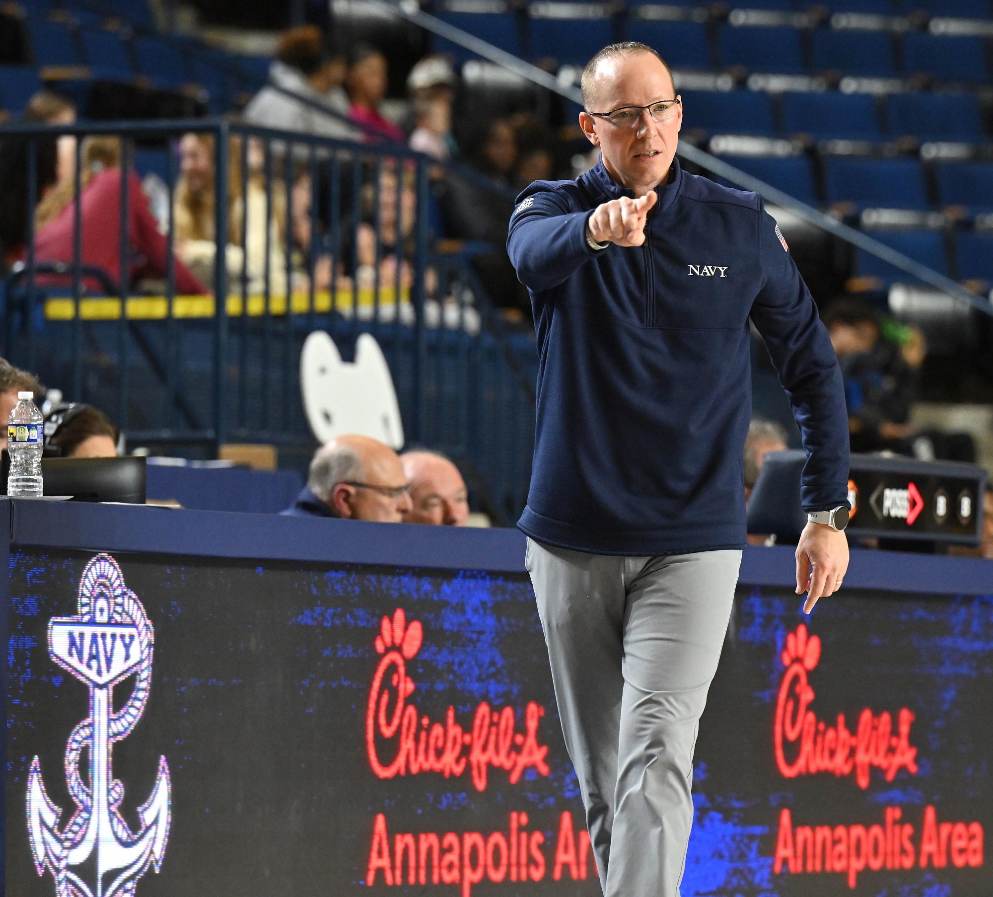 Dec. 19, 2025 Navy coach Joe Perry in the second...