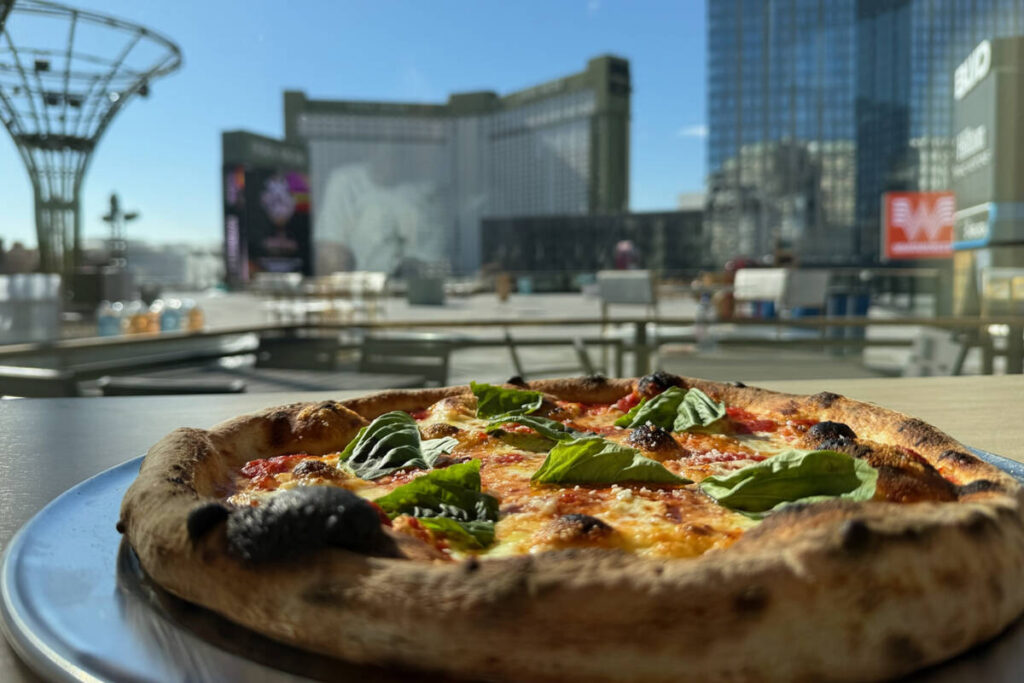An OG Pizza with a view of the Las Vegas Strip from How Ya Dough'n, which is set to open a ...