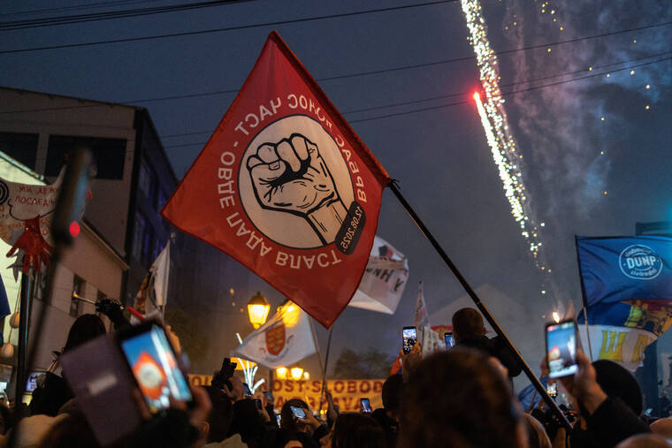 REUTERS/MARKO DJURICA
                                Students and citizens attend a protest over alleged government pressure on the State University of Novi Pazar, after many of its students lost their status and dozens of professors lost their jobs, in Novi Pazar, Serbia.