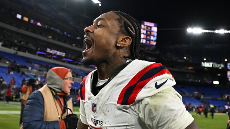 New England Patriots wide receiver Stefon Diggs celebrates as runs off the field after an NFL football game against the Baltimore Ravens, Sunday, Dec. 21, 2025, in Baltimore.