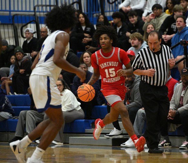 Homewood-Flossmoor's Jayden McDonald (15) brings the ball up court against Sandburg during a SouthWest Conference game Tuesday, Jan. 6, 2026 in Orland Park, IL. (Steve Johnston/for the Daily Southtown)