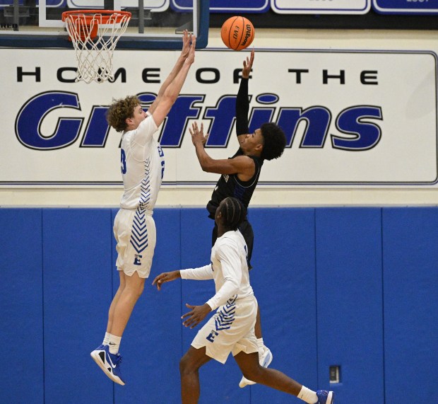 Lincoln-Way East's Aaron Stauffacher (23) goes up to block the shot attempt by Sandburg's Malachi Perkins (1) during a SouthWest Suburban Conference game Tuesday, Jan. 13, 2026 in Frankfort, IL. (Steve Johnston/for the Daily Southtown)