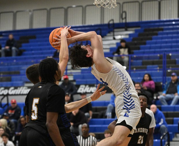 Lincoln-Way East's Aidan Deist (5) tries to get a shot off against Sandburg during a SouthWest Suburban Conference game Tuesday, Jan. 13, 2026 in Frankfort, IL. (Steve Johnston/for the Daily Southtown)