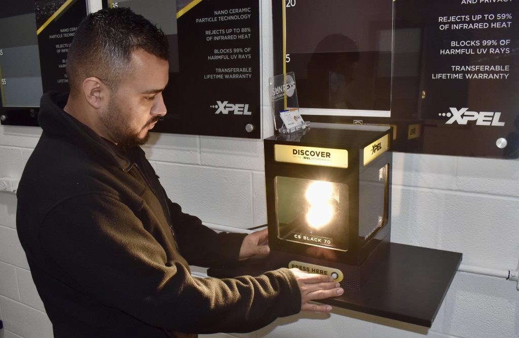 Naperville biz does car window tinting, wrapping, protection