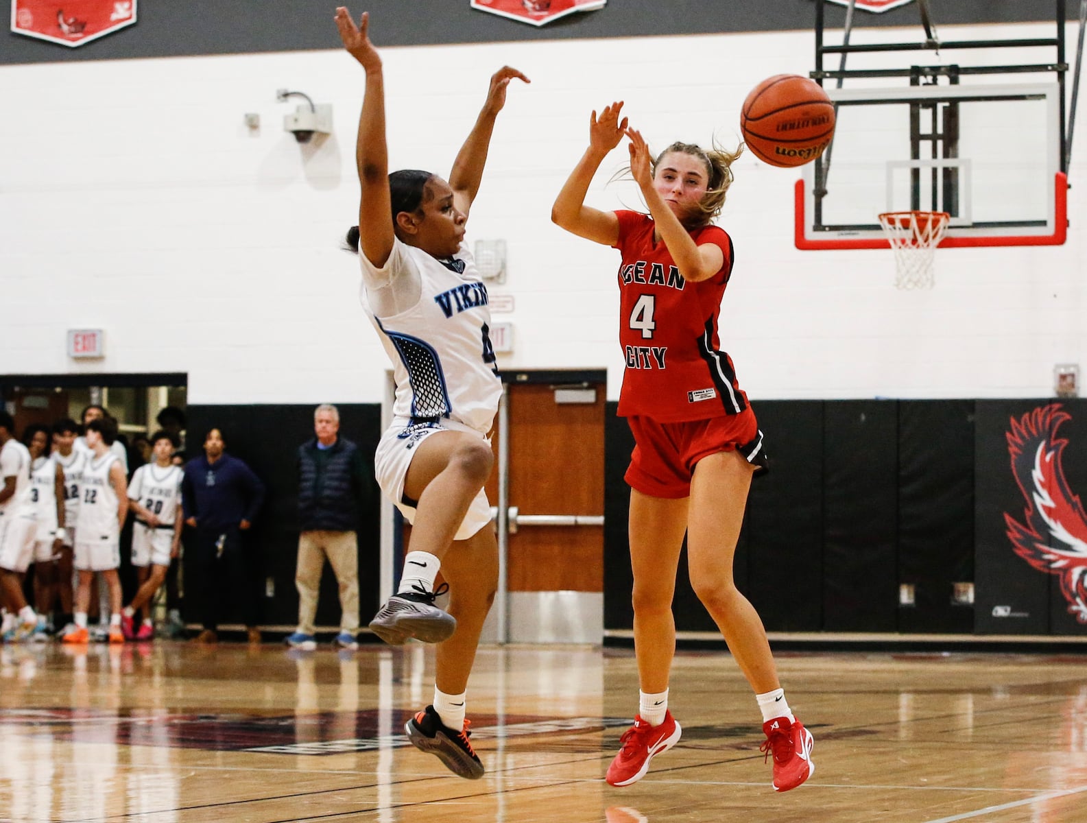 Demyah Townsend (4) of Atlantic City tries to block the inbounds pass away from Scarlett Fletcher (4) of Ocean City during the girls basketball game between Ocean City and Atlantic City at Ocean City High School in Ocean City, NJ on 1/14/26.