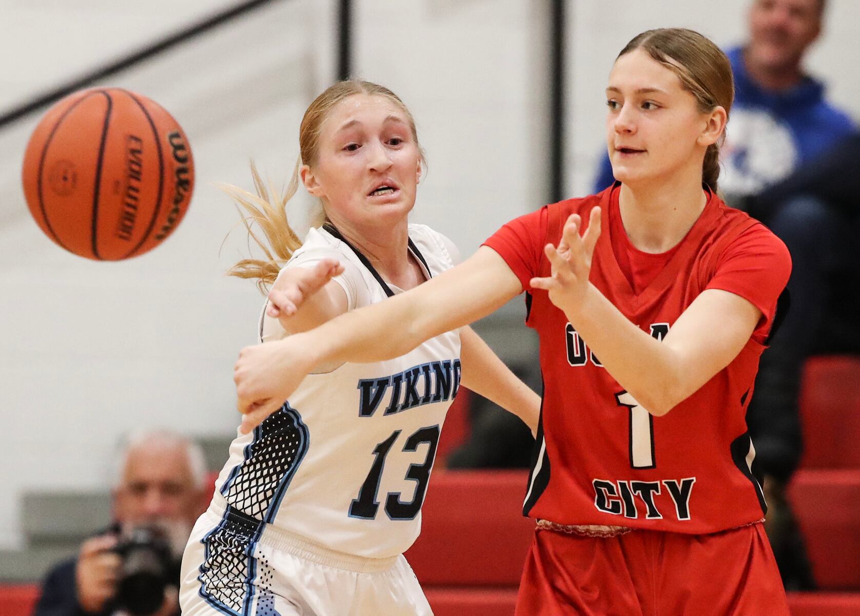 Mya Dever (1) of Ocean City makes a pass against Juliana Margliano (13) of Atlantic City during the girls basketball game between Ocean City and Atlantic City at Ocean City High School in Ocean City, NJ on 1/14/26.
