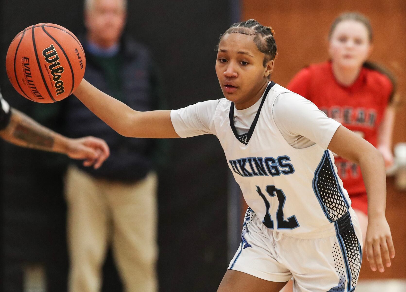 Monet Parker (12) of Atlantic City takes control of the loose ball during the girls basketball game between Ocean City and Atlantic City at Ocean City High School in Ocean City, NJ on 1/14/26.
