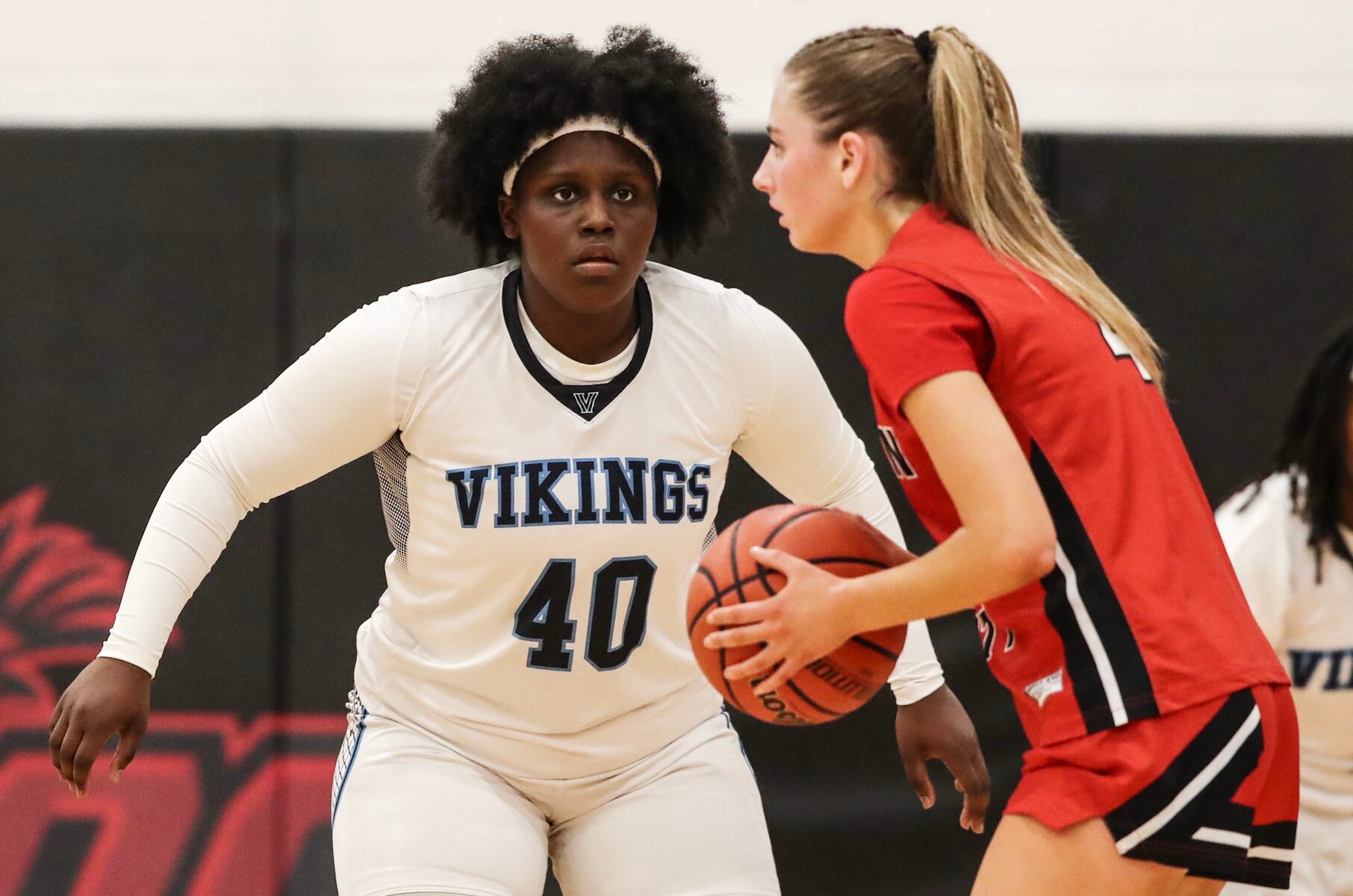 Peyton Moore (40) of Atlantic City defends against Scarlett Fletcher (4) of Ocean City during the girls basketball game between Ocean City and Atlantic City at Ocean City High School in Ocean City, NJ on 1/14/26.