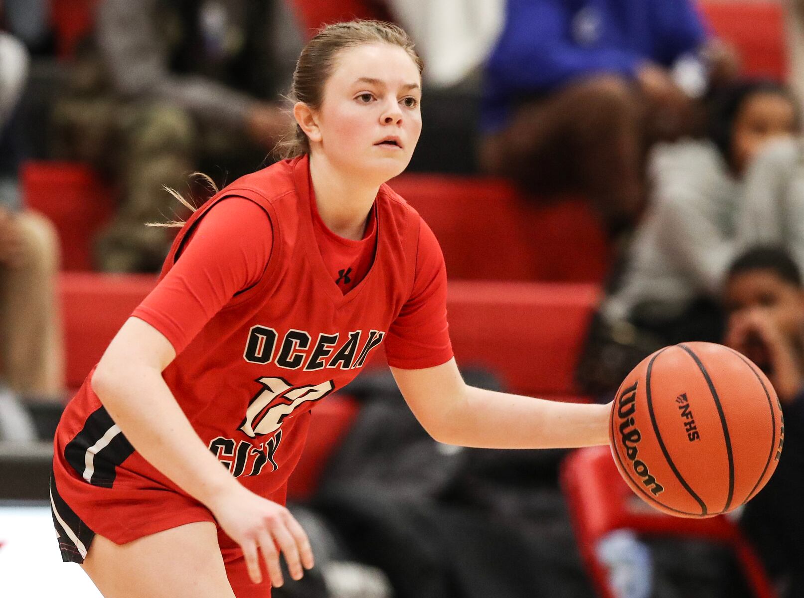 Casey Adamson (12) of Ocean City dribbles during the girls basketball game between Ocean City and Atlantic City at Ocean City High School in Ocean City, NJ on 1/14/26.