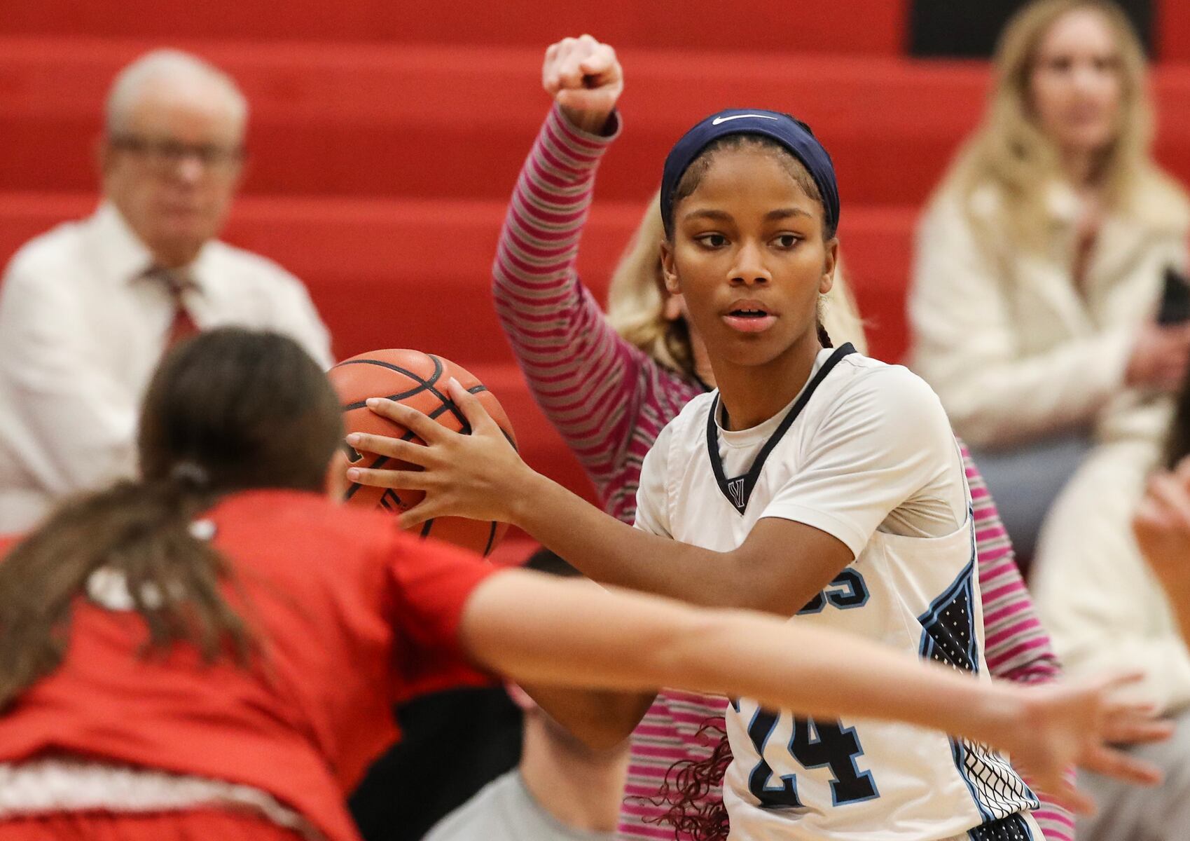 Taison Parker (24) of Atlantic City runs the offense against Allie Hudson (3) of Ocean City during the girls basketball game between Ocean City and Atlantic City at Ocean City High School in Ocean City, NJ on 1/14/26.