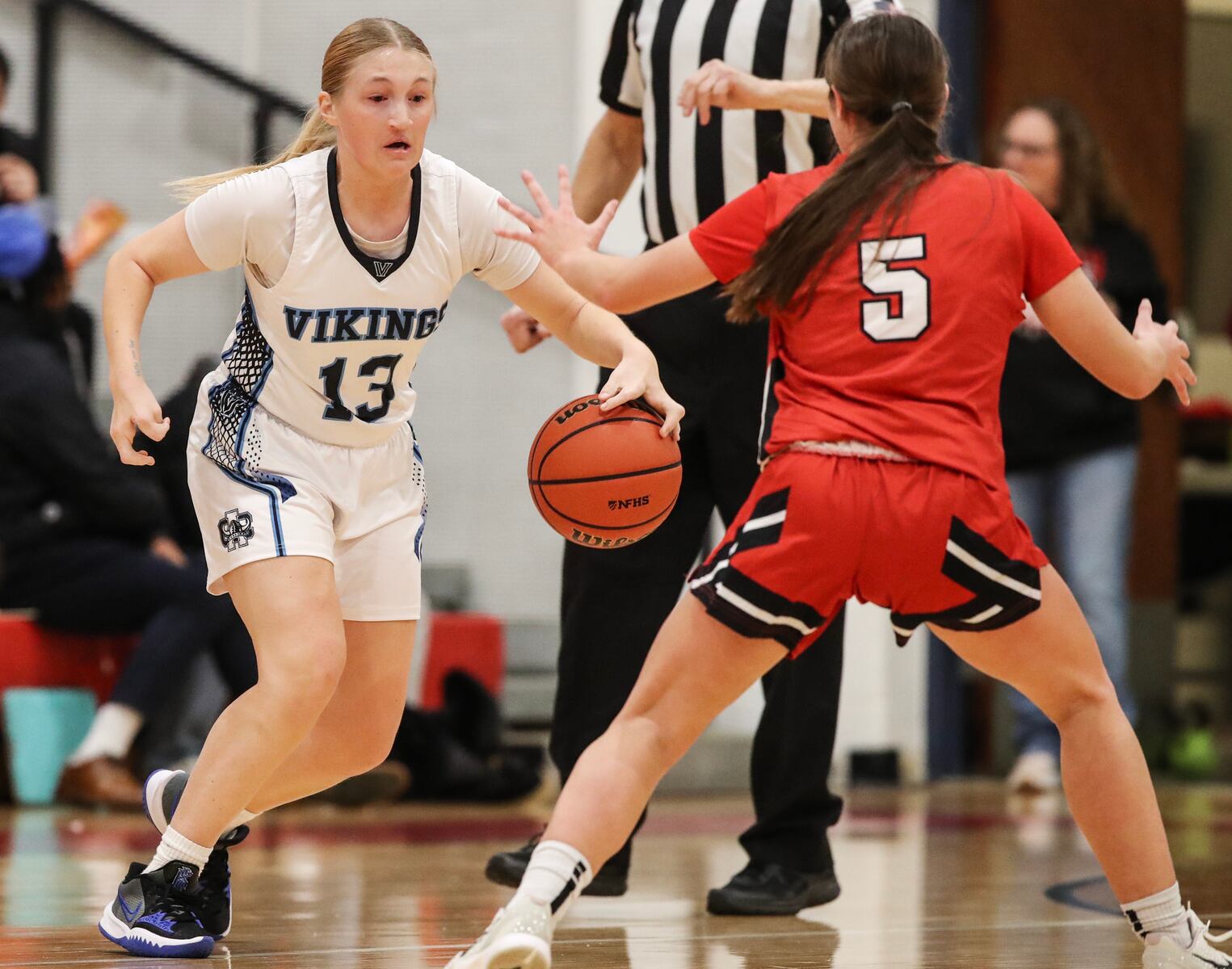 Juliana Margliano (13) of Atlantic City dribbles against Gabby Henry (5) of Ocean City during the girls basketball game between Ocean City and Atlantic City at Ocean City High School in Ocean City, NJ on 1/14/26.