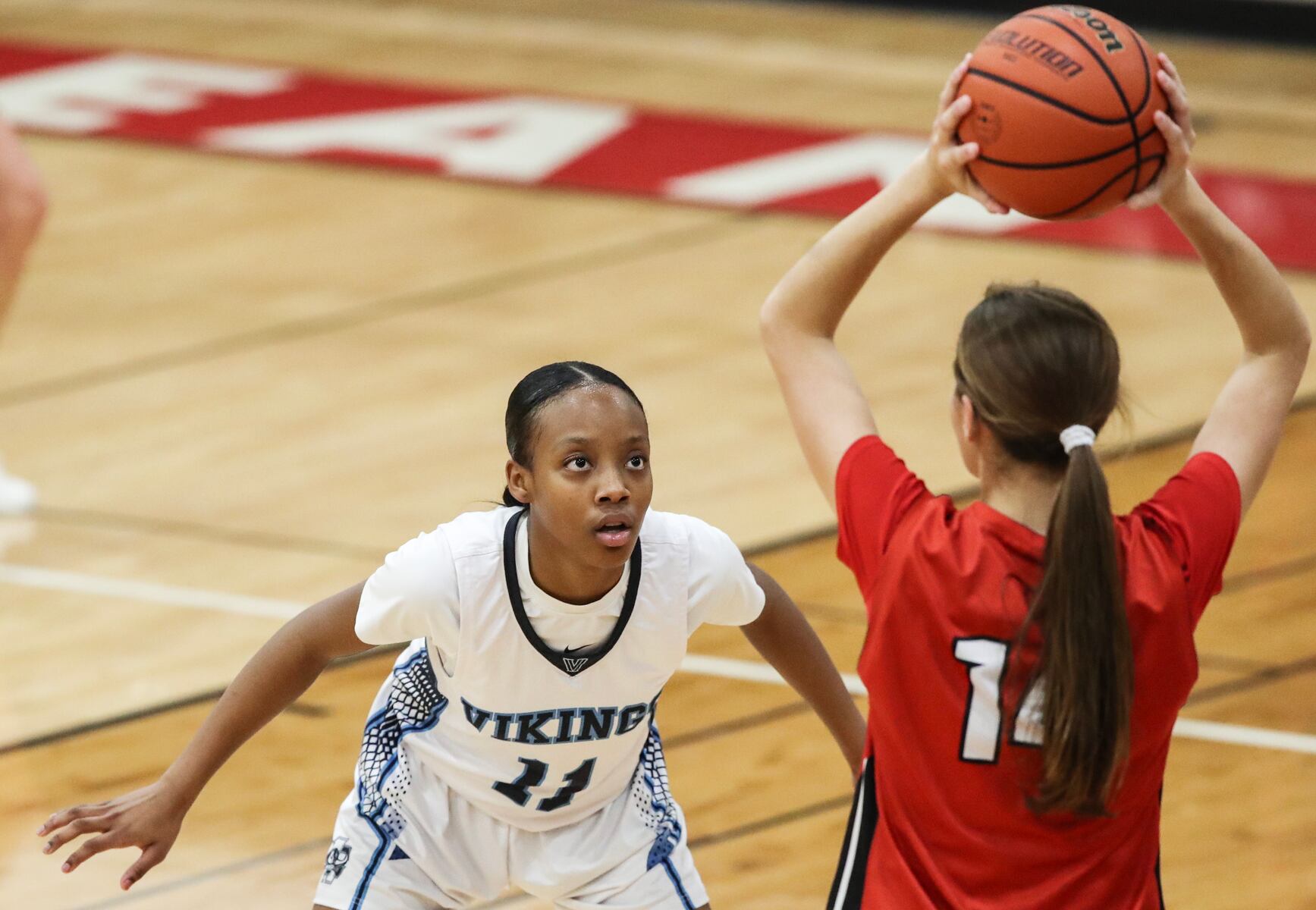 Ayana Frierson (11) of Atlantic City defends against Marley Ostrander (14) of Ocean City during the girls basketball game between Ocean City and Atlantic City at Ocean City High School in Ocean City, NJ on 1/14/26.