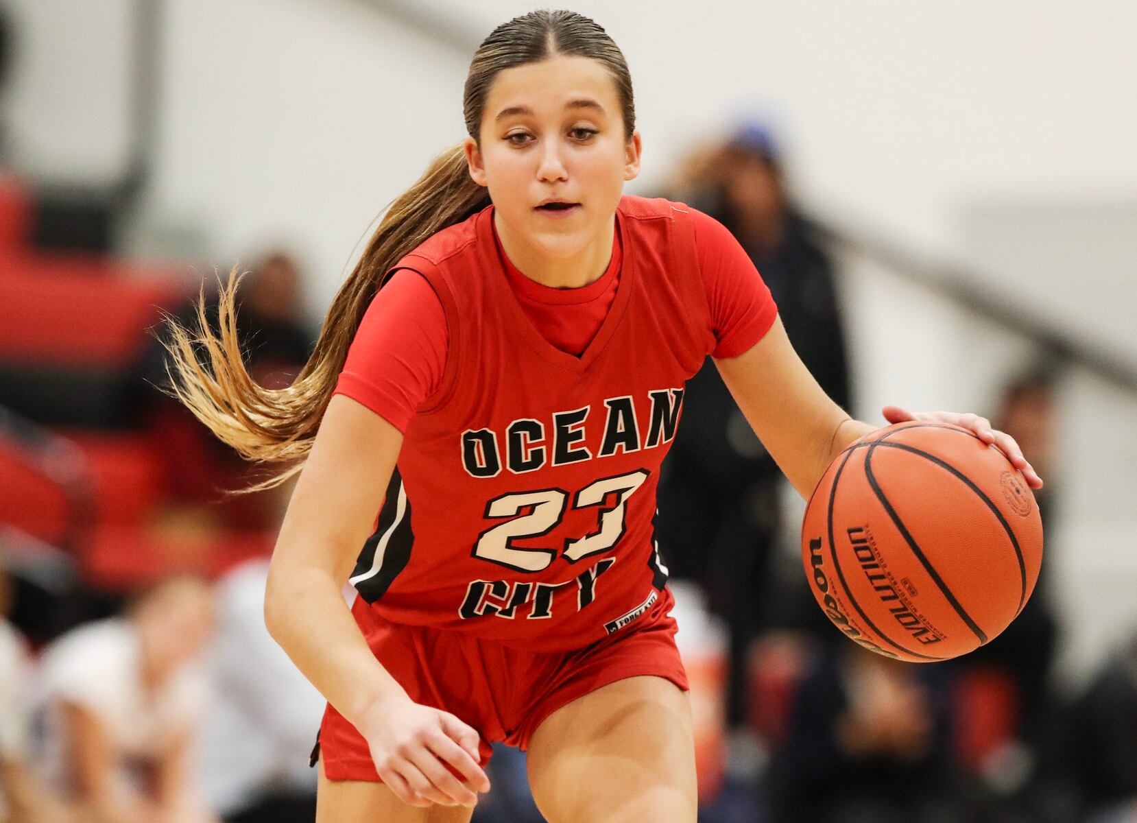 Kaia Chew (23) of Ocean City dribbles during the girls basketball game between Ocean City and Atlantic City at Ocean City High School in Ocean City, NJ on 1/14/26.