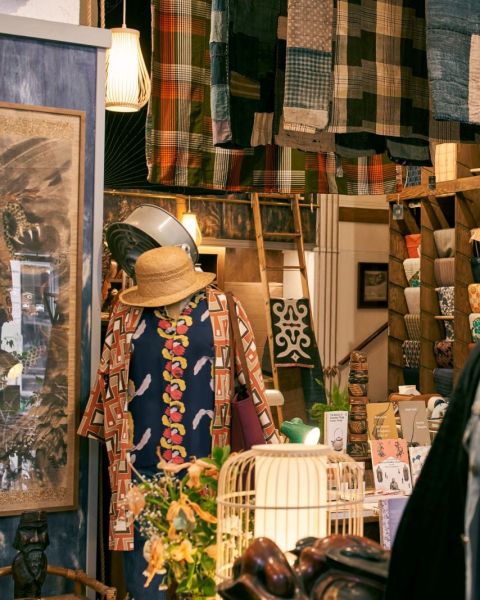 a shop display featuring apparel, fabric and homewares