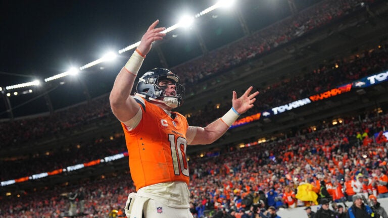 Denver Broncos quarterback Bo Nix (10) celebrates a touchdown in the 4th quarter against the Buffalo Bills in an NFL divisional playoff football game, Sunday, Jan. 18, 2026 in Denver.