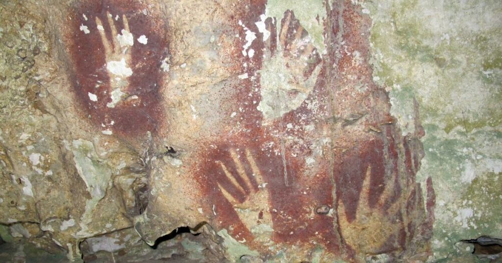 A 67,800-year-old handprint may be the world’s oldest rock art