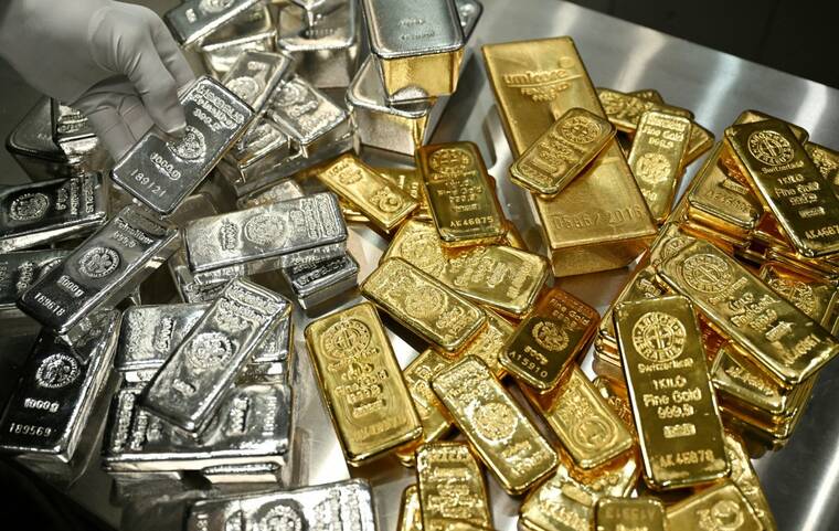 Gold nears record $5,600 as silver smashes $120 amid Iran tensions