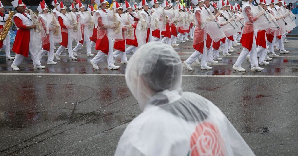 Rain soaks Rose Parade in California and snow squalls hit Midwest and Northeast on first day of 2026