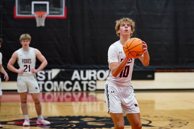 Yorkville's Graham Martinson (10) shoot a free throw during a Ernie Kivisto Hoops Fest game against St. Charles North in Aurora on Saturday, Jan. 31, 2026. (Sean King / For The Beacon-News)