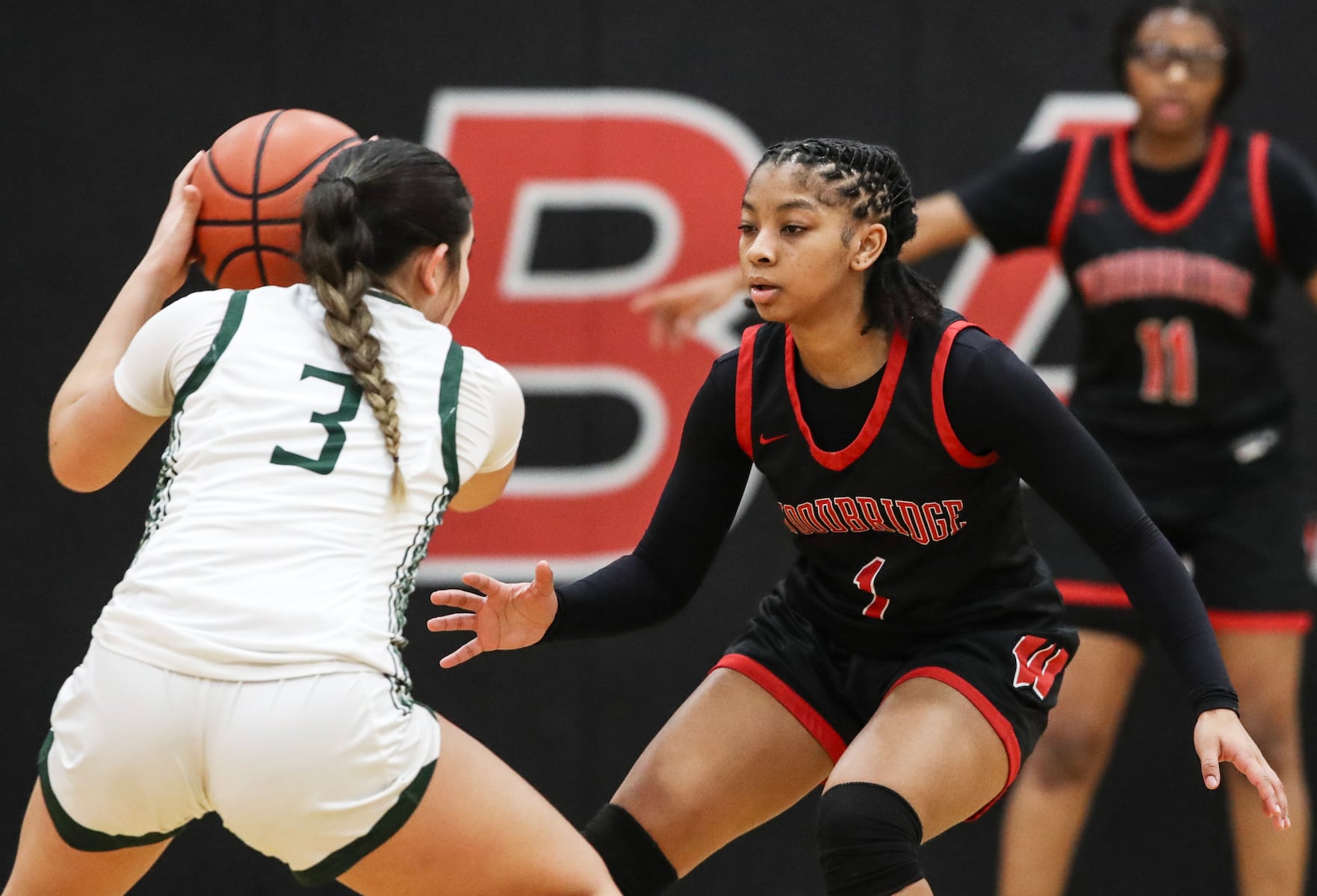 Laila Shakoor (1) of Woodbridge defends against Sophia Tannura (3) of East Brunswick during the girls basketball game between Woodbridge and East Brunswick at Woodbridge High School in Woodbridge, NJ on 2/2/26.