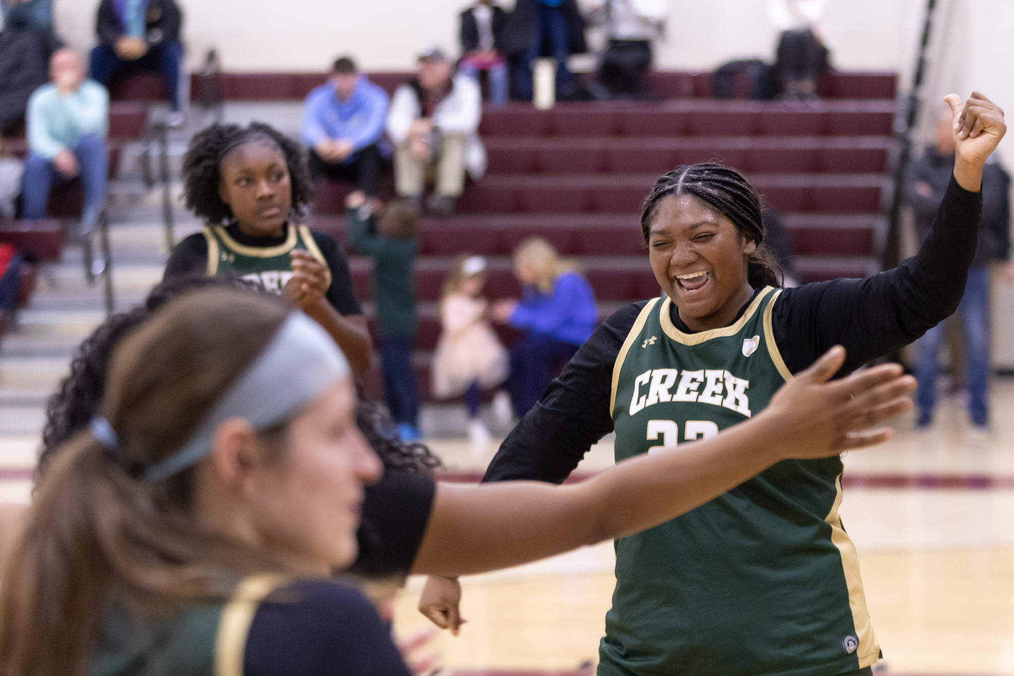 Indian Creekâs Rebekah Young celebrates with her teammates after defeating...