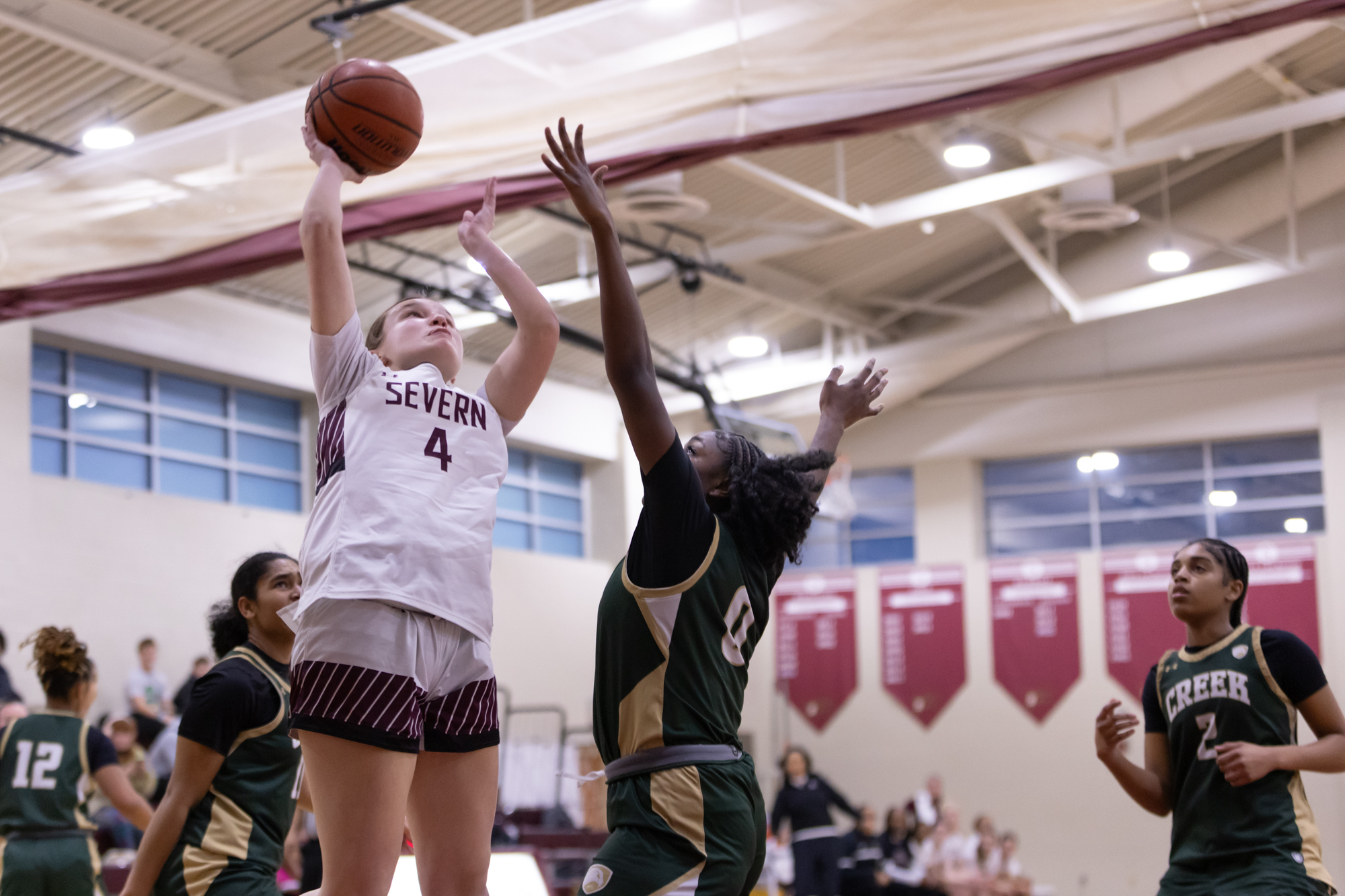 Severnâs Kendall Austin goes in for a layup during the...