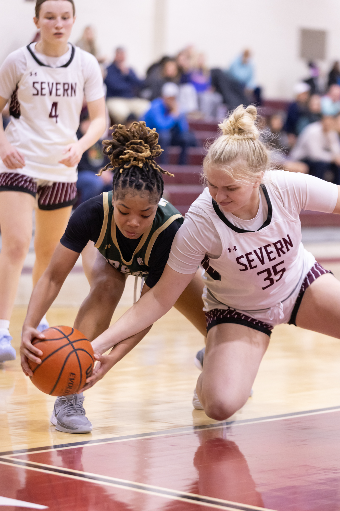 Indian Creekâs Norah Young and Val Waugh battle for a...