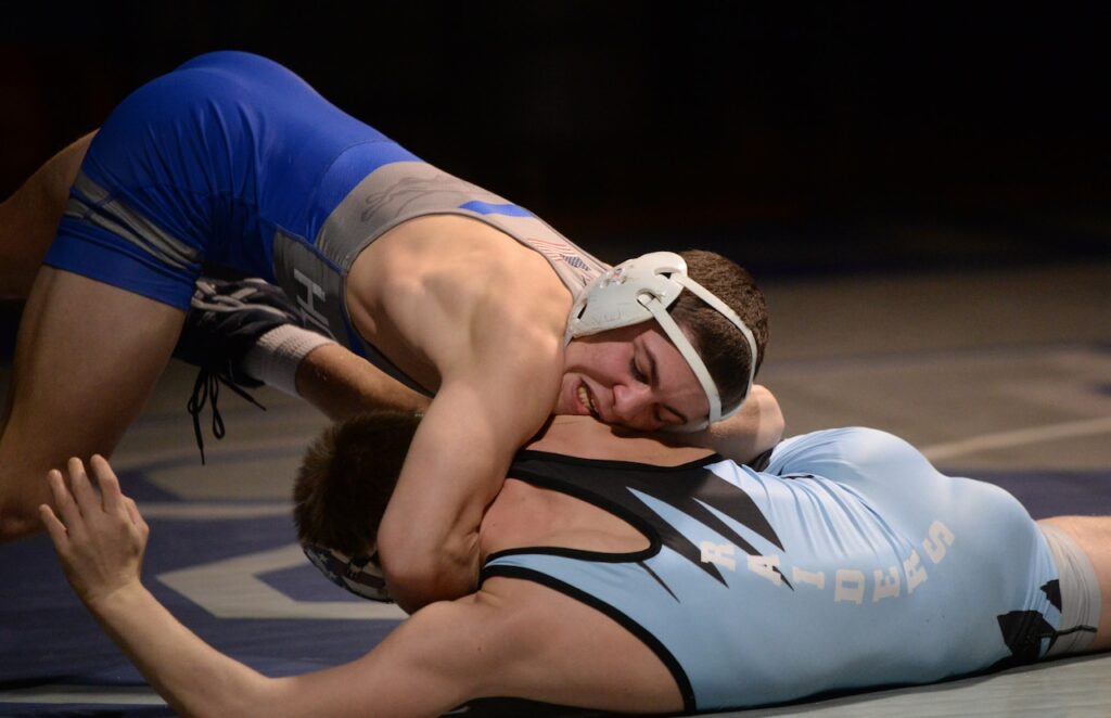 This wrestling team had its best moment in a forgettable season with upset of No. 1 seed